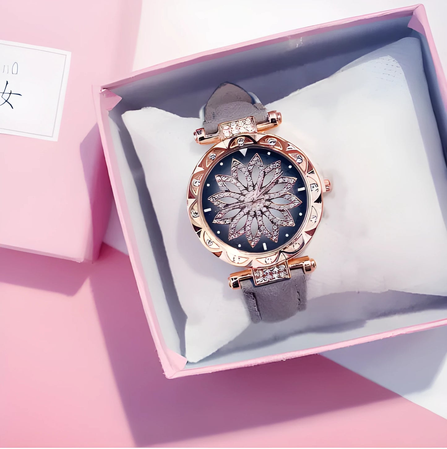 Diamond bezel women's fashion watch with round dial on wrist, showing colour options of red, purple, green, blue, black, pink, beige, grey, and brown.