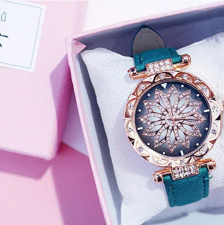 Diamond bezel women's fashion watch with round dial on wrist, showing colour options of red, purple, green, blue, black, pink, beige, grey, and brown.