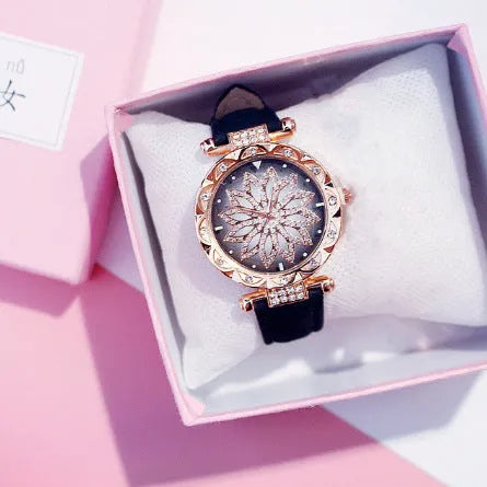 Diamond bezel women's fashion watch with round dial on wrist, showing colour options of red, purple, green, blue, black, pink, beige, grey, and brown.