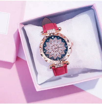Diamond bezel women's fashion watch with round dial on wrist, showing colour options of red, purple, green, blue, black, pink, beige, grey, and brown.