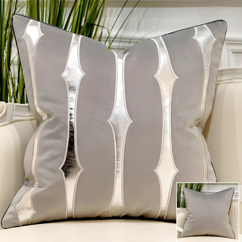 Embroidered throw pillow with removable cover in plush fabric, showing detailed embroidery pattern