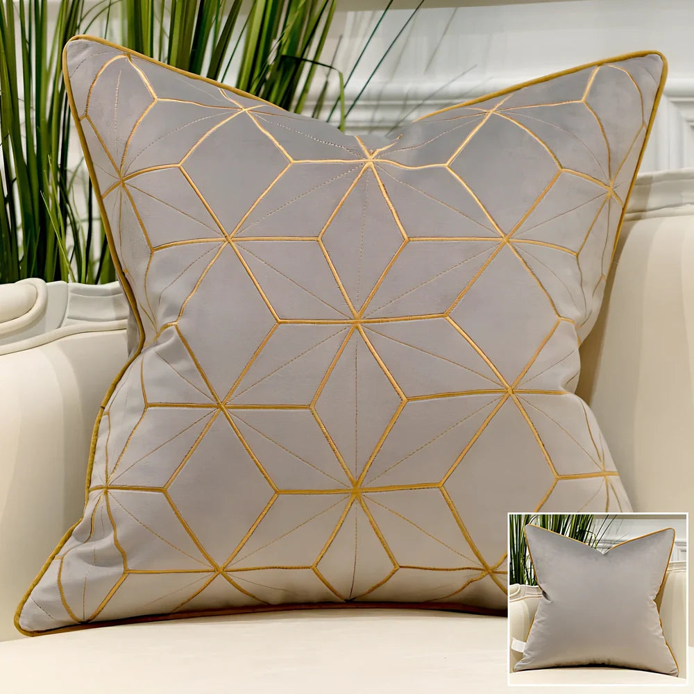 Embroidered throw pillow with removable cover in plush fabric, showing detailed embroidery pattern
