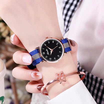Luminous Starry Sky Watch with rainbow canvas strap and stainless steel buckle
