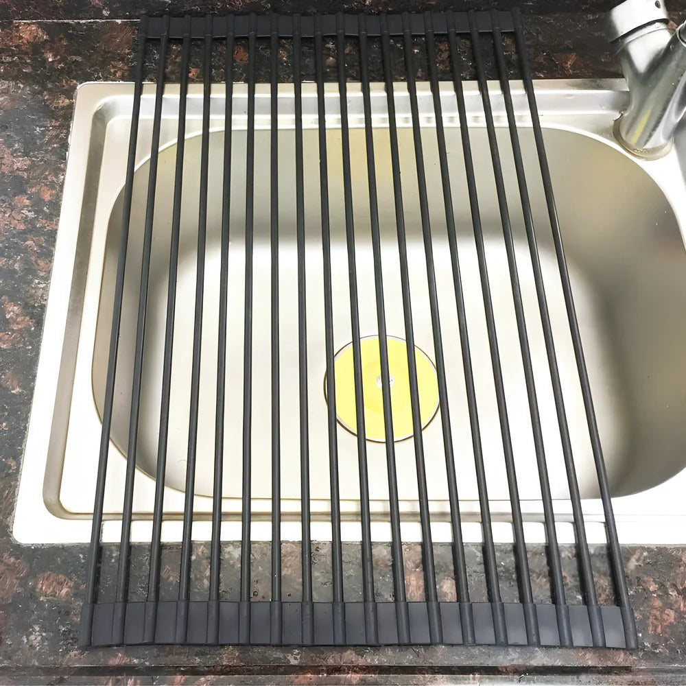 Black folding stainless steel sink drain rack with silicone edges, shown both unfolded for drying and folded for storage