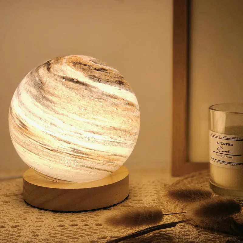 Nordic style table lamp with glass shade in choice of seven colours, USB-powered for bedside use