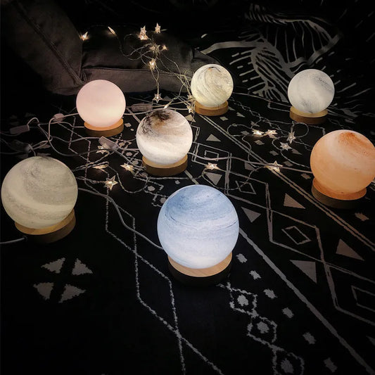 Nordic style table lamp with glass shade in choice of seven colours, USB-powered for bedside use