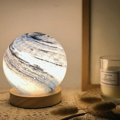 Nordic style table lamp with glass shade in choice of seven colours, USB-powered for bedside use