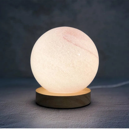 Nordic style table lamp with glass shade in choice of seven colours, USB-powered for bedside use