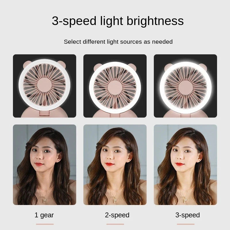 Portable USB-powered mini fan with LED fill light for taking selfies and videos in low-light conditions