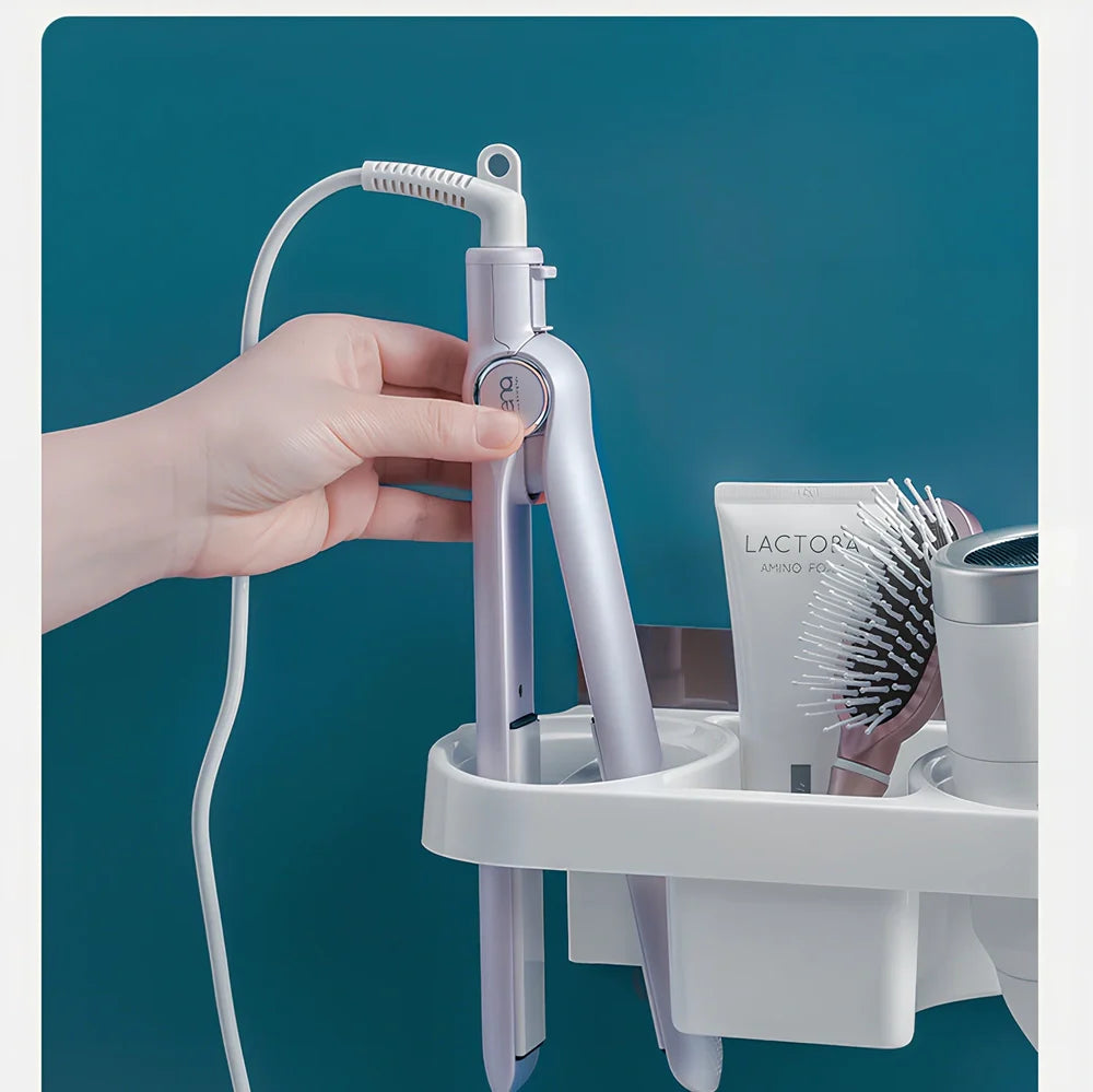 White plastic hair dryer storage rack with 20 compartments mounted on bathroom wall