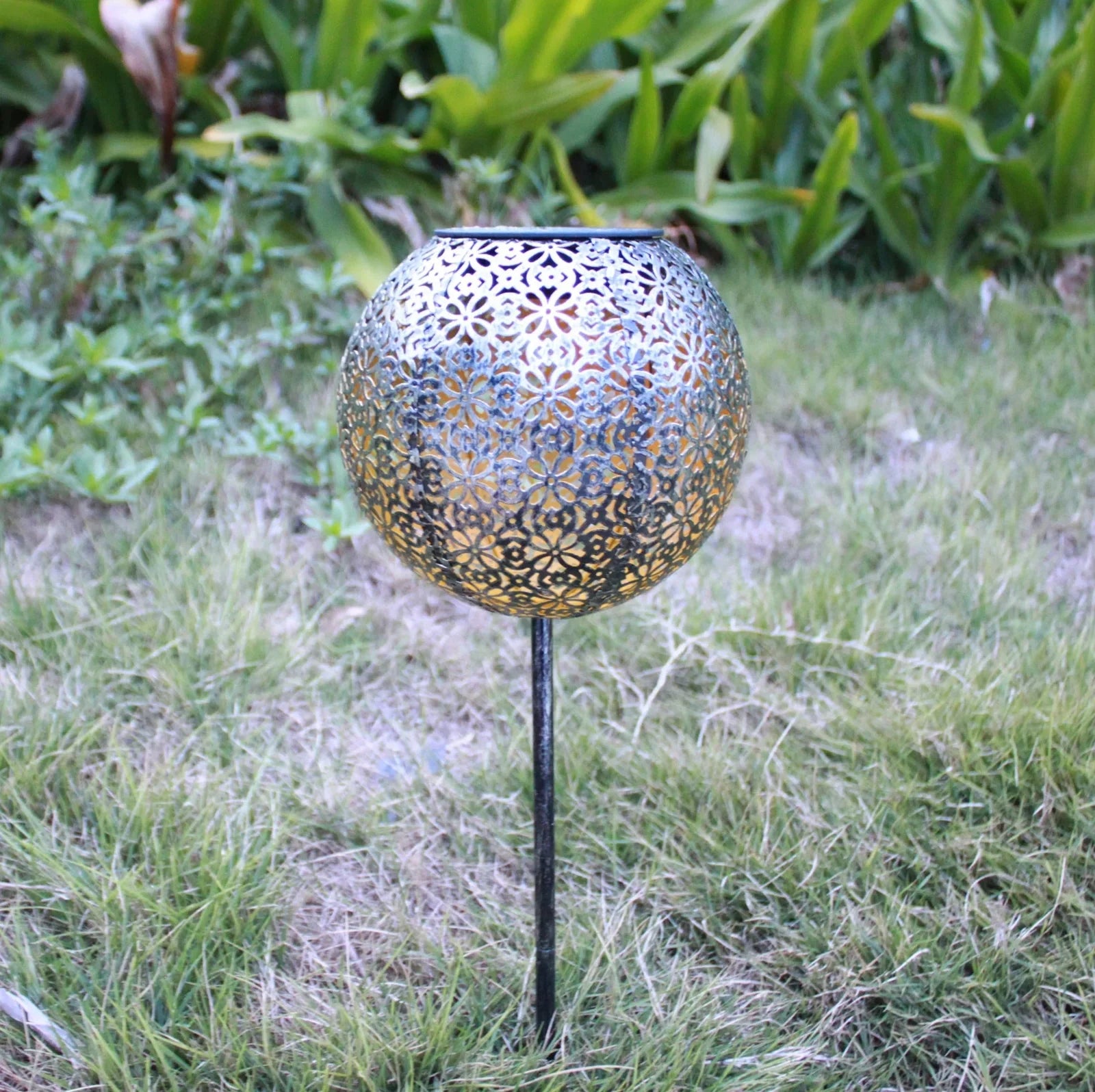 Solar wrought iron ground ball lamp with 15x15x46cm dimensions and LED lighting for garden pathways