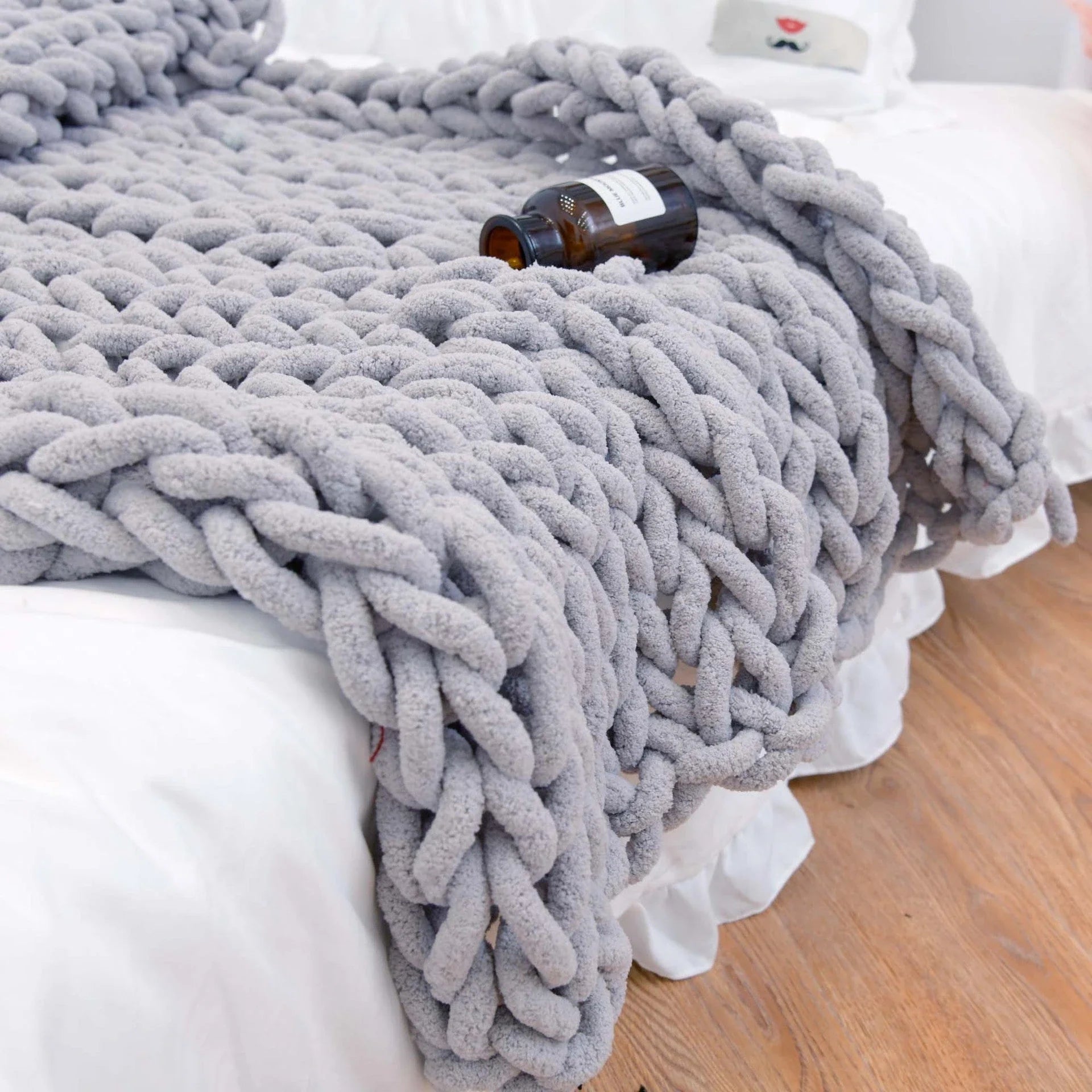Cozy and plush chenille knit sofa blanket in various colors and sizes for living room or bedroom decor