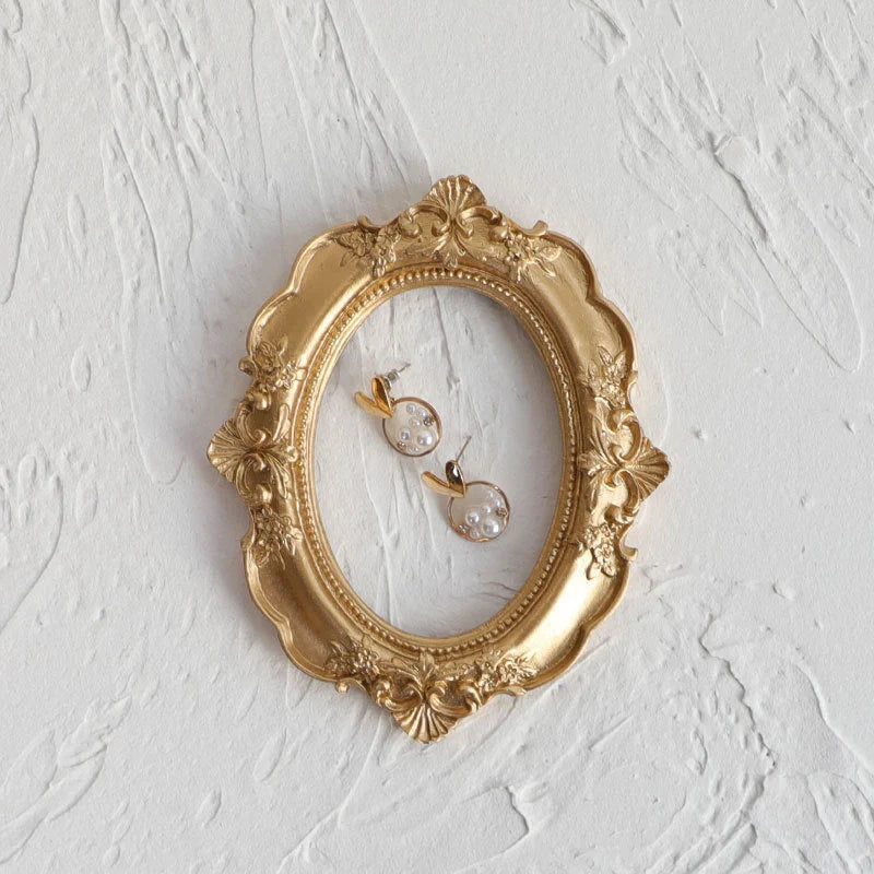 Nordic-style golden retro photo frame for jewelry and art display