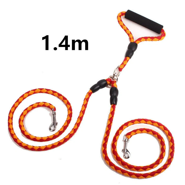 Double-ended dog walking rope with padded handles and reflective threads, showing metal clip hooks