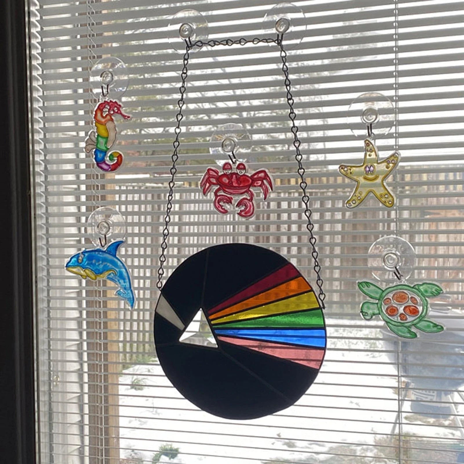 Mesmerizing abstract Moon-themed wall art in round and oval shapes, made of premium acrylic materials for a captivating living room decor piece.