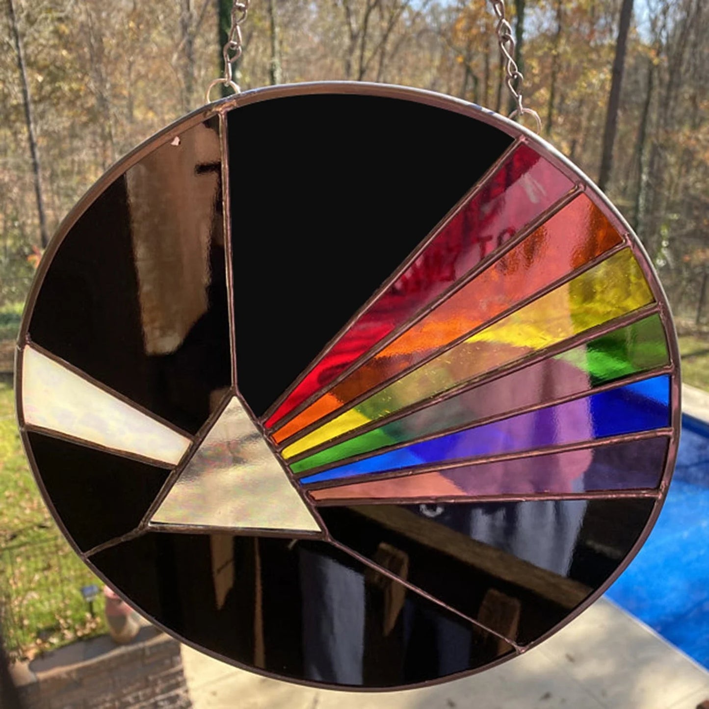 Mesmerizing abstract Moon-themed wall art in round and oval shapes, made of premium acrylic materials for a captivating living room decor piece.