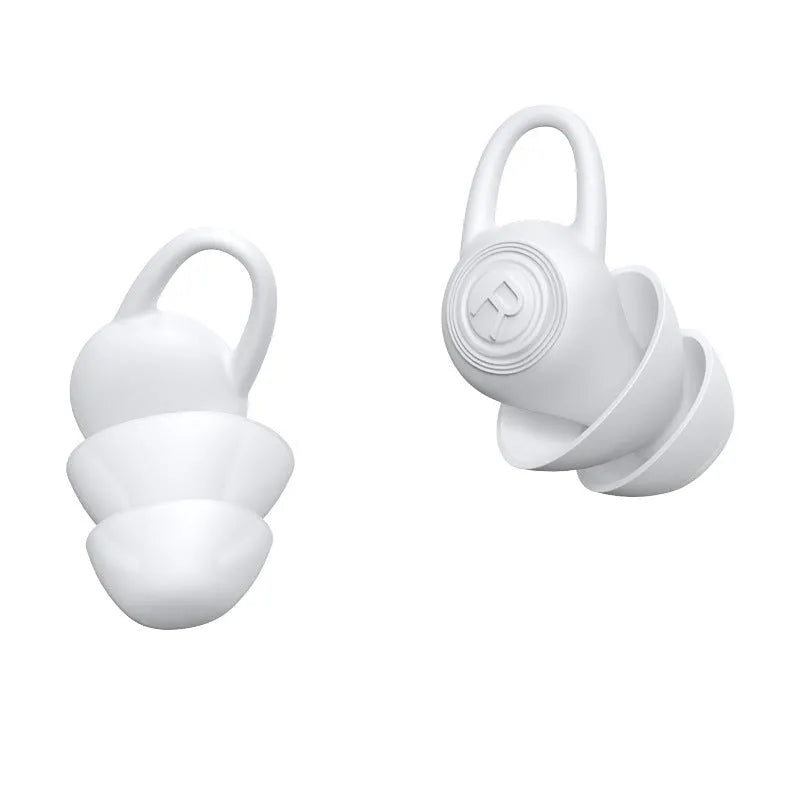 A single pair of white soft silicone ear plugs on a clean background.