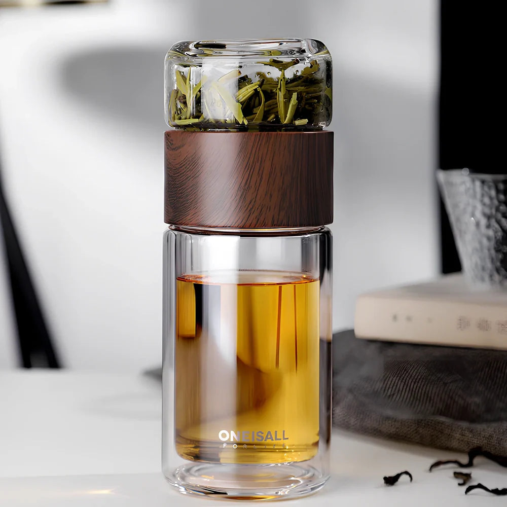 Wood grain separated tea cup with double-wall borosilicate construction and leak-proof lid showing measurement markings