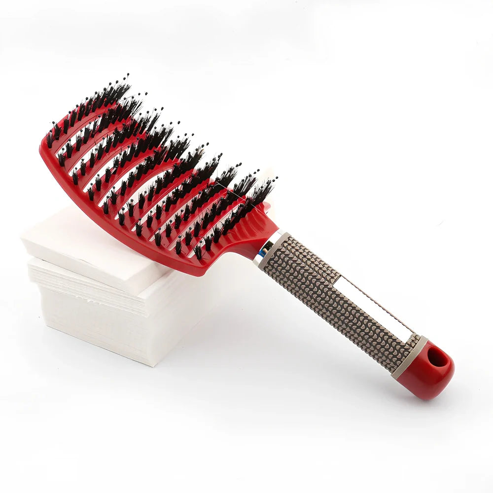 Large curved hairbrush with boar bristles showing 15cm width and natural bristle distribution