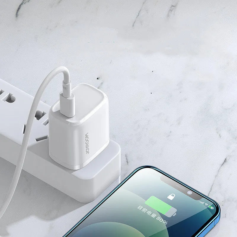 Travel charger with USB-C port in black, blue, or white colours with UK EU US plug options