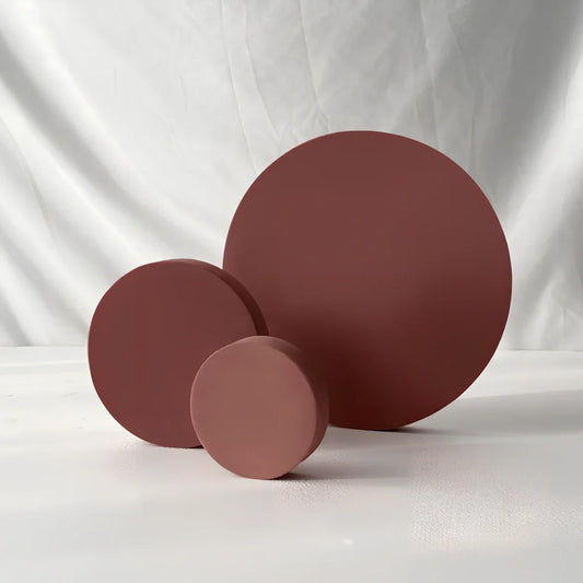 Beauty photography props set showing round, square and trapezoid shapes in six colours for product staging