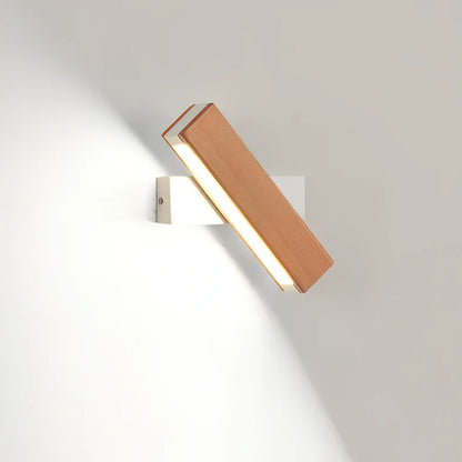 Adjustable wooden LED wall lamp in black finish with directional lighting bar for modern interiors