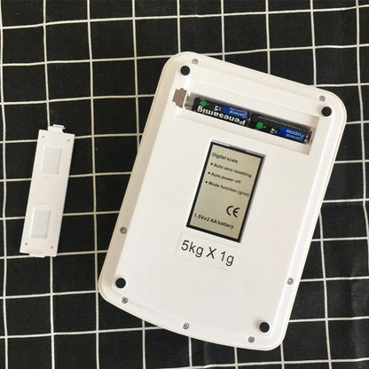 SF-400A electronic kitchen scale with digital display showing weight measurement