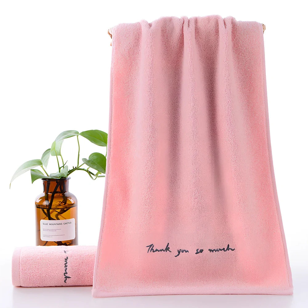 Long-staple cotton face wash towel with embroidery detailing measuring 74x34cm