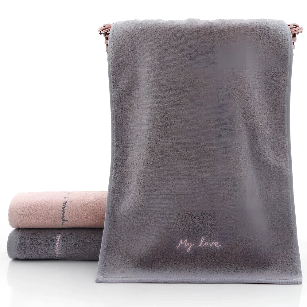 Long-staple cotton face wash towel with embroidery detailing measuring 74x34cm