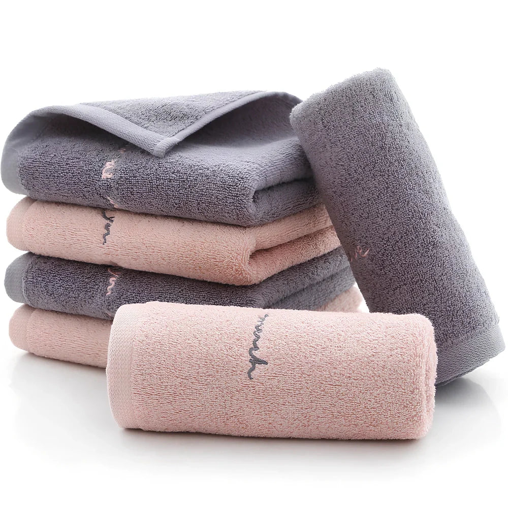 Long-staple cotton face wash towel with embroidery detailing measuring 74x34cm