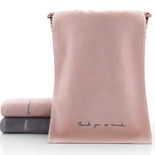 Long-staple cotton face wash towel with embroidery detailing measuring 74x34cm