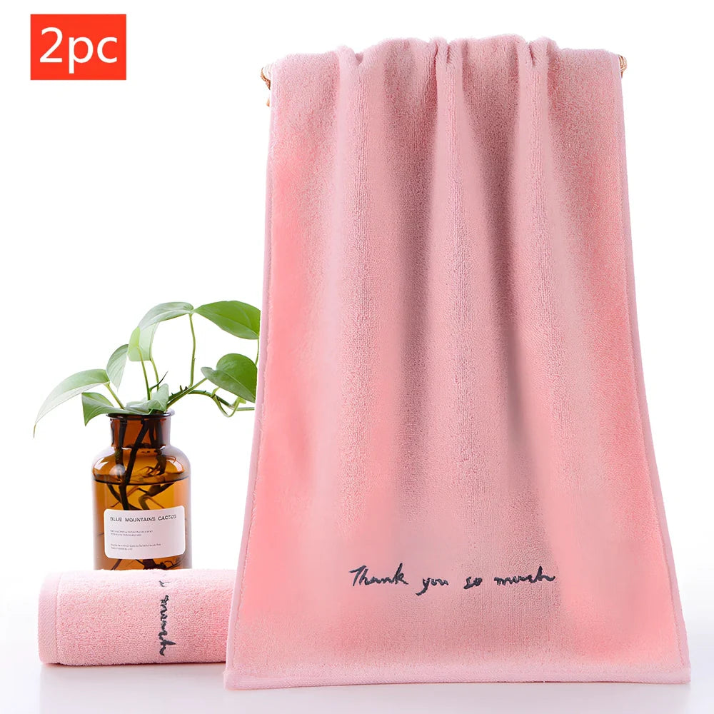 Long-staple cotton face wash towel with embroidery detailing measuring 74x34cm