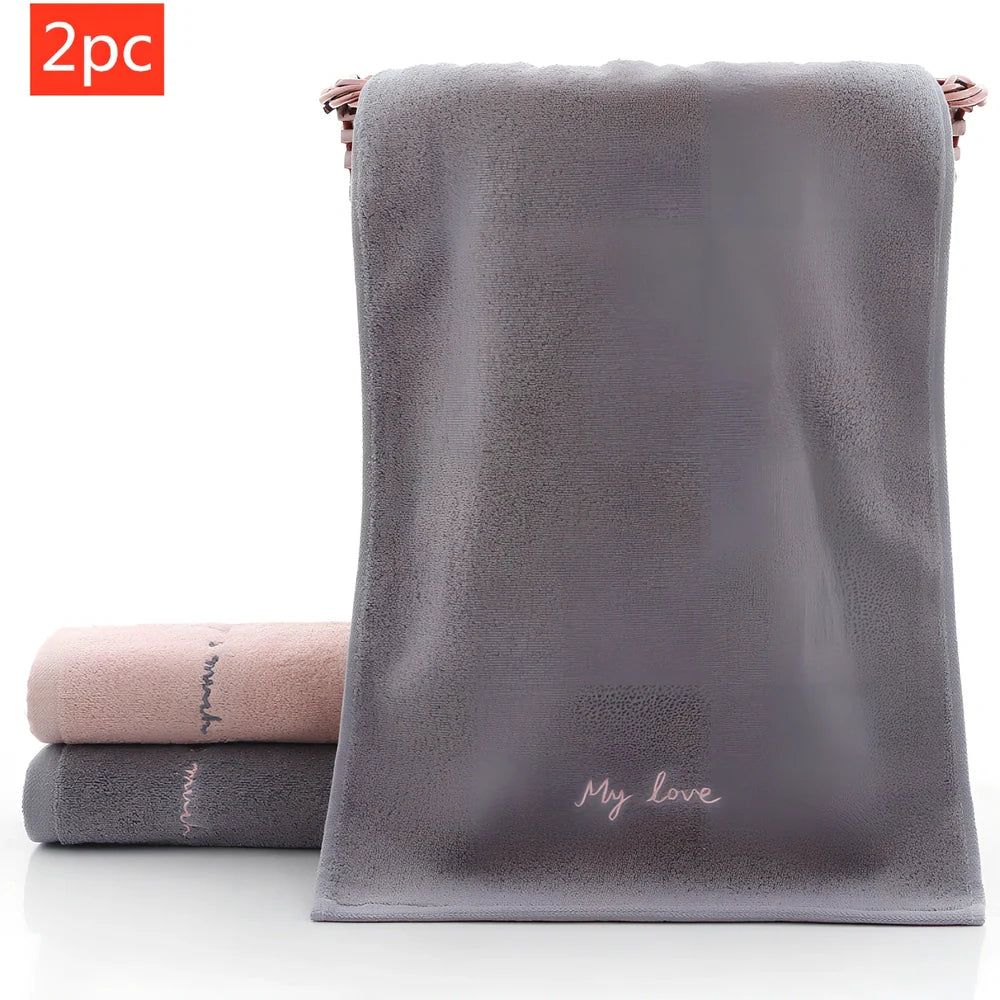 Long-staple cotton face wash towel with embroidery detailing measuring 74x34cm