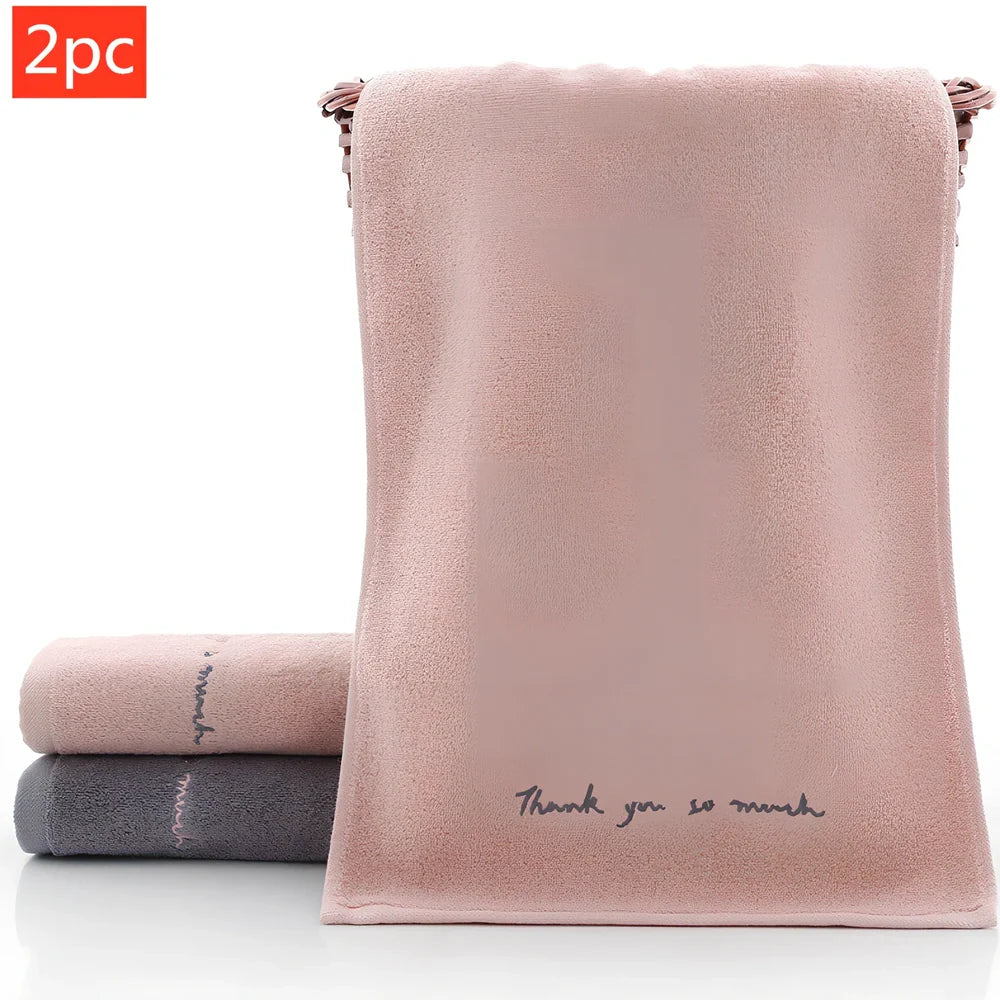 Long-staple cotton face wash towel with embroidery detailing measuring 74x34cm