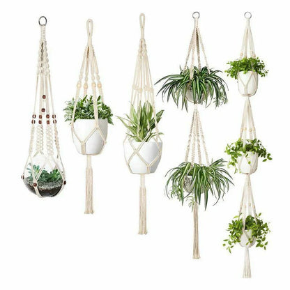 Set of four hand-made macrame hanging baskets for plants, made from 100% cotton rope.
