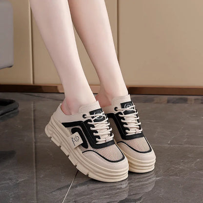 Women's black mesh half slipper with round toe and rubber sole, shown on a white background.