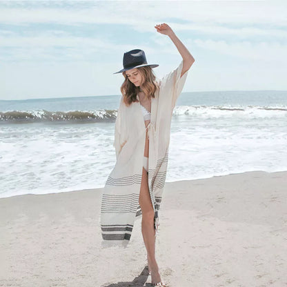 White cotton crochet knitted beach pareo dress with tassels, perfect for beach outings and casual wear