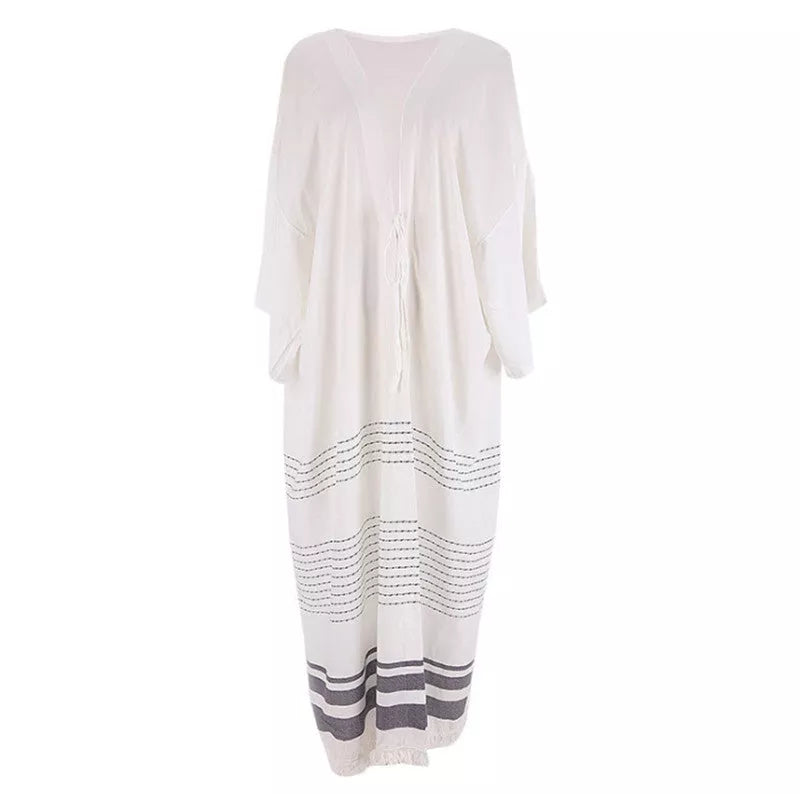 White cotton crochet knitted beach pareo dress with tassels, perfect for beach outings and casual wear
