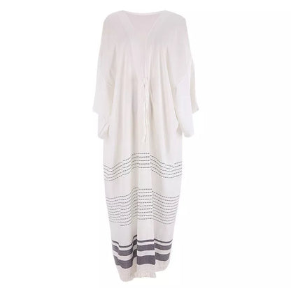White cotton crochet knitted beach pareo dress with tassels, perfect for beach outings and casual wear