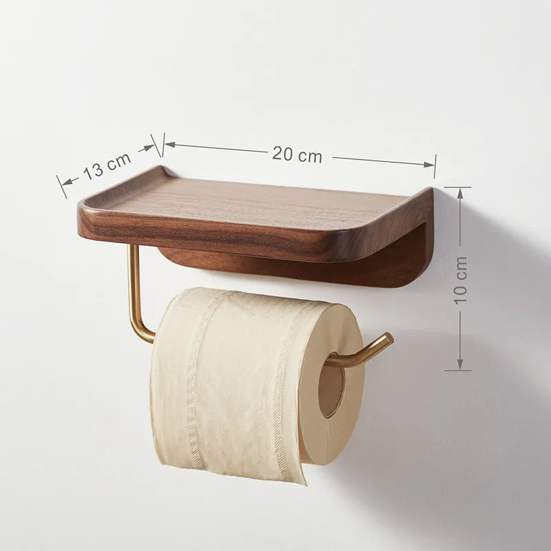 Solid wood wall-mounted paper towel and toilet roll holder in walnut with brass fittings.