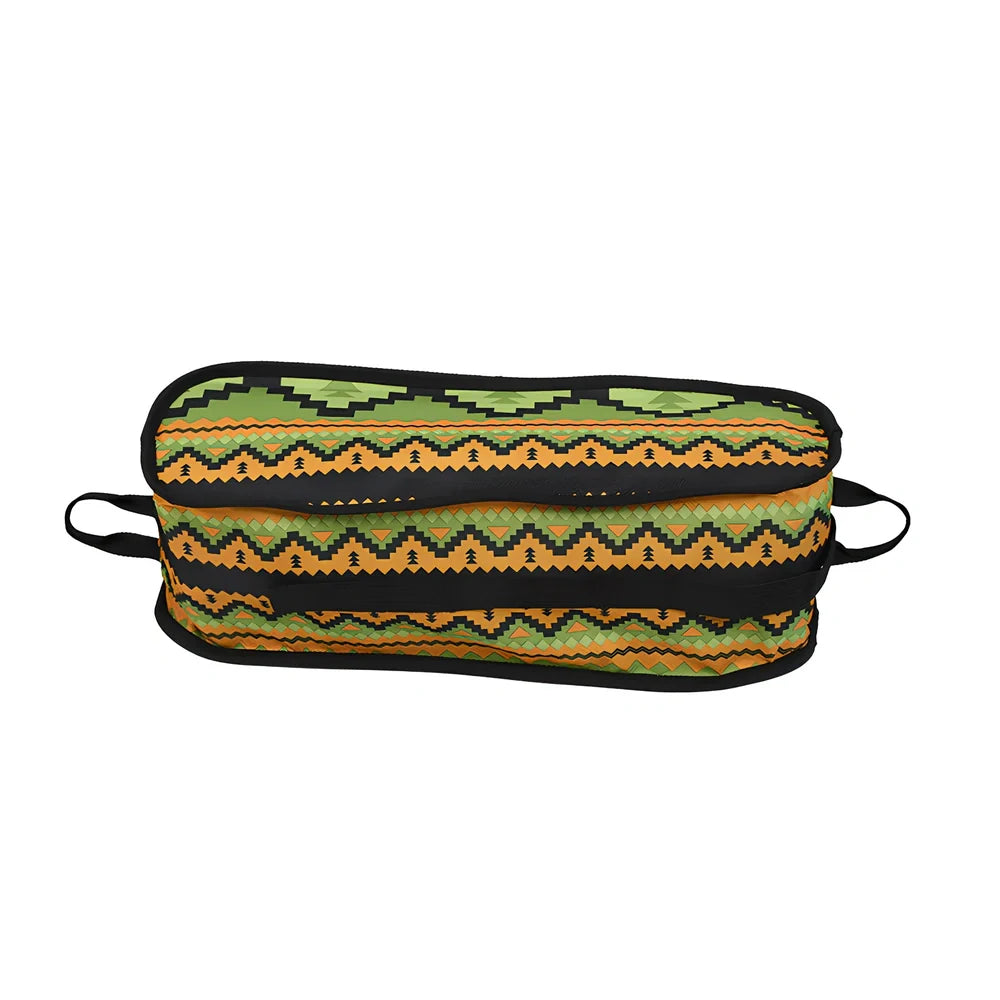 Red aluminium alloy folding moon chair unfolded on grass with folding mechanism visible