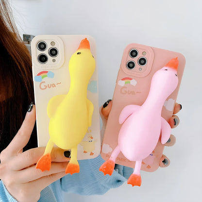 Cartoon print silicone phone case for iPhone in yellow, white, and pink colours.
