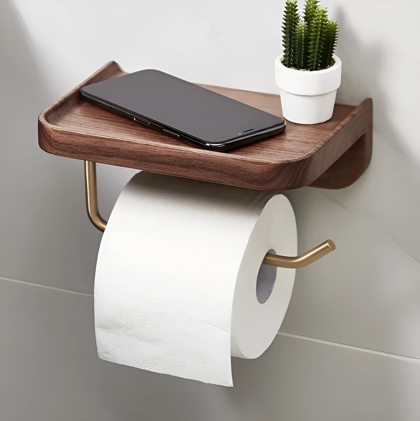 Solid wood wall-mounted paper towel and toilet roll holder in walnut with brass fittings.