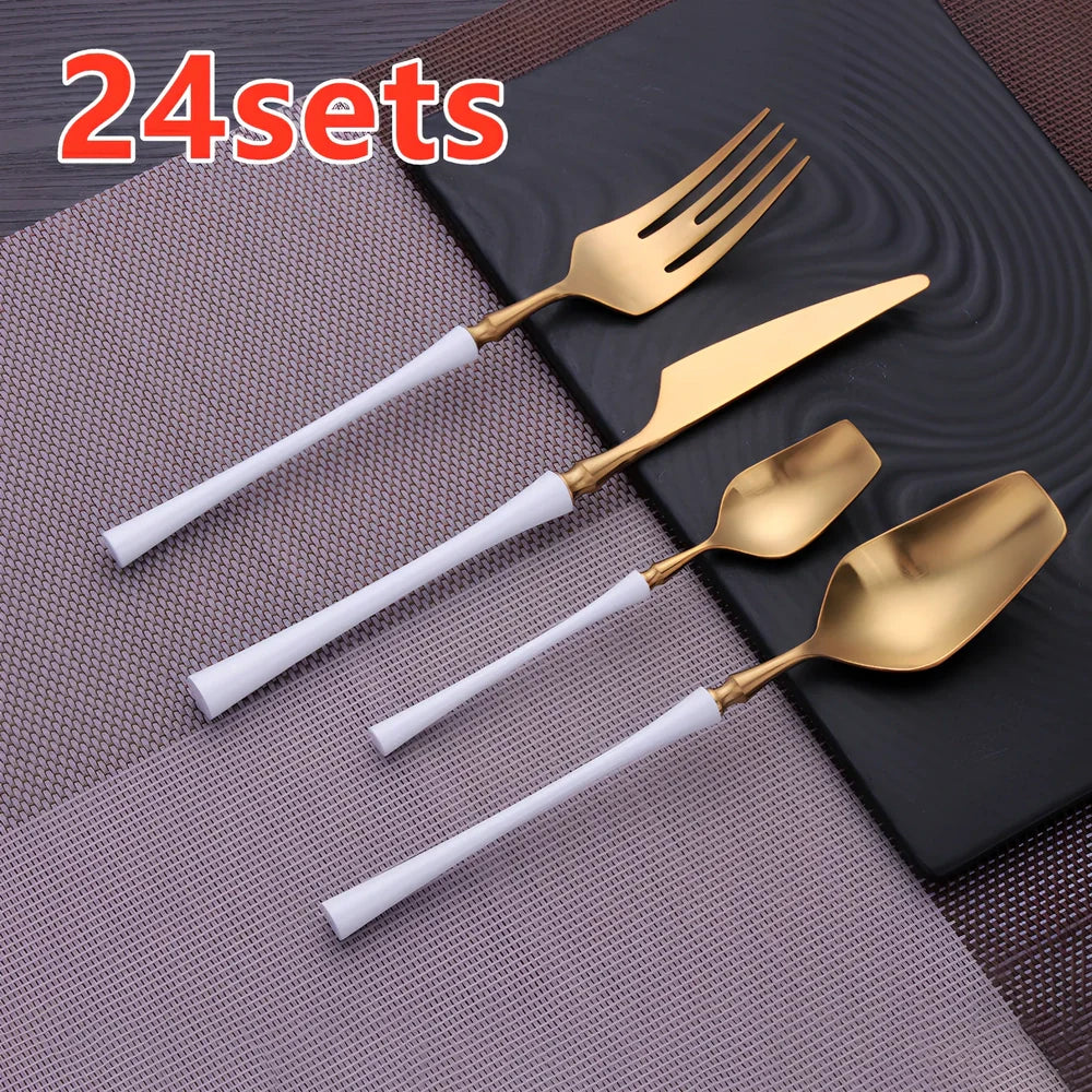 Four-piece stainless steel cutlery set showing main knife, fork, spoon, and teaspoon with mirror finish