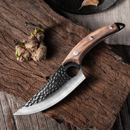 Versatile stainless steel scimitar knife with retro-inspired design, suitable for cutting and deboning meats and poultry