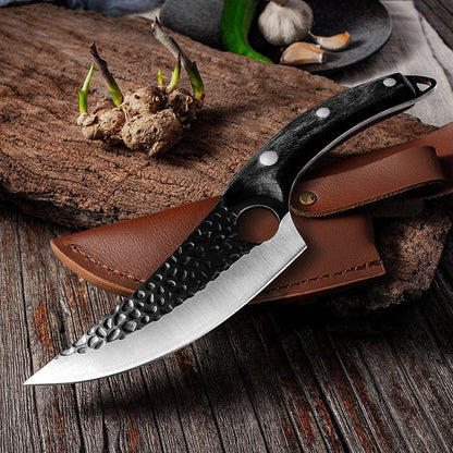 Versatile stainless steel scimitar knife with retro-inspired design, suitable for cutting and deboning meats and poultry