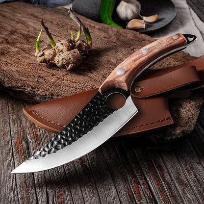 Versatile stainless steel scimitar knife with retro-inspired design, suitable for cutting and deboning meats and poultry