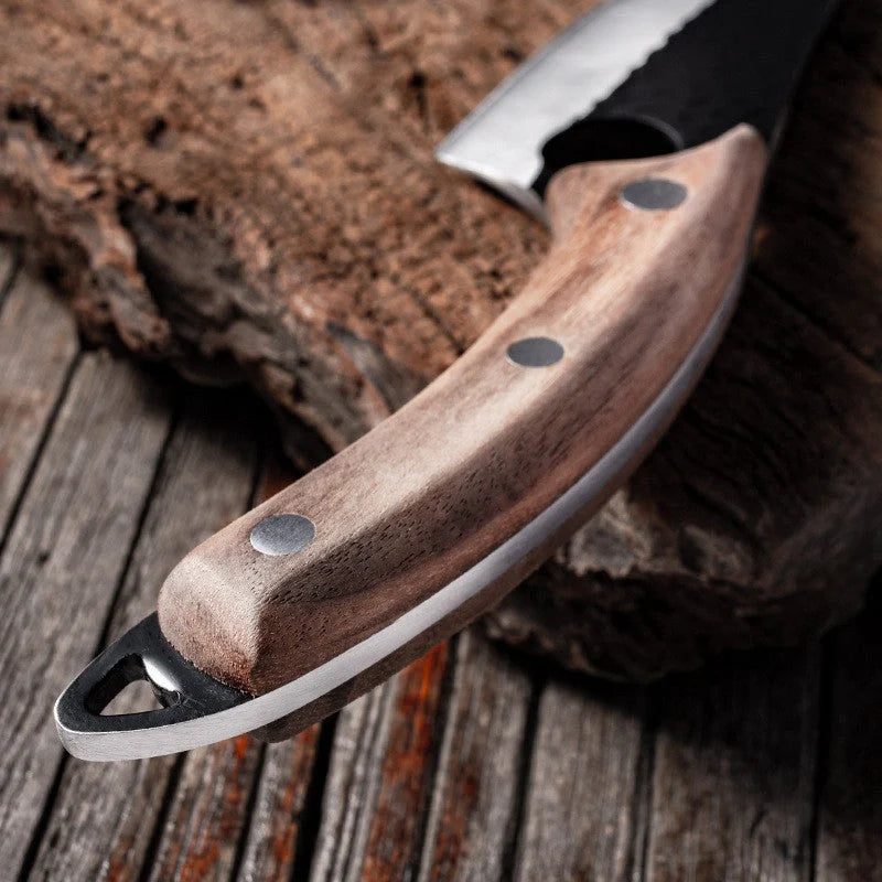 Versatile stainless steel scimitar knife with retro-inspired design, suitable for cutting and deboning meats and poultry