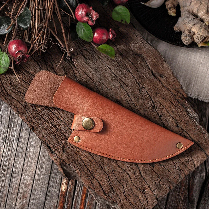 Versatile stainless steel scimitar knife with retro-inspired design, suitable for cutting and deboning meats and poultry