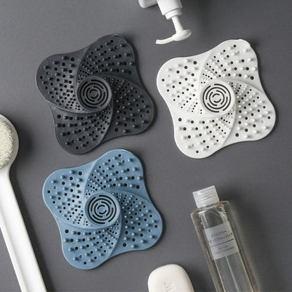 TPR silicone hair filter for sinks and bathtubs, available in black, white, and blue